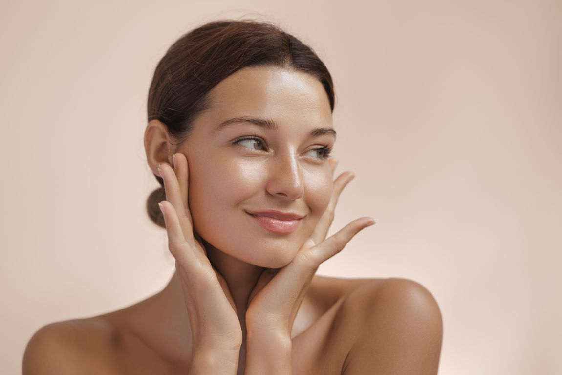 Before Face Lift Consultation woman feeling face after facelift